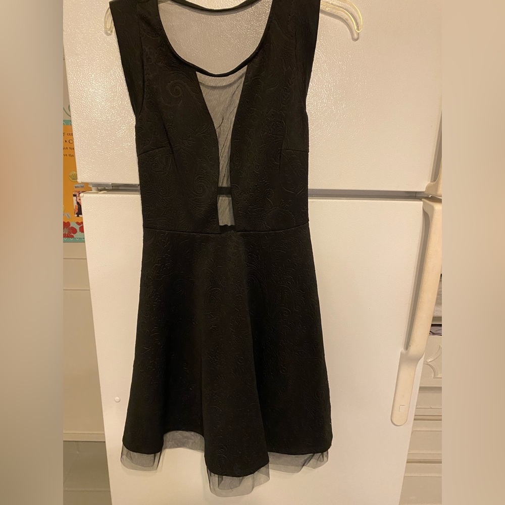 Beautiful Black Embossed dress with net trim and back. M